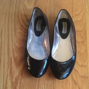 Black shiny flats